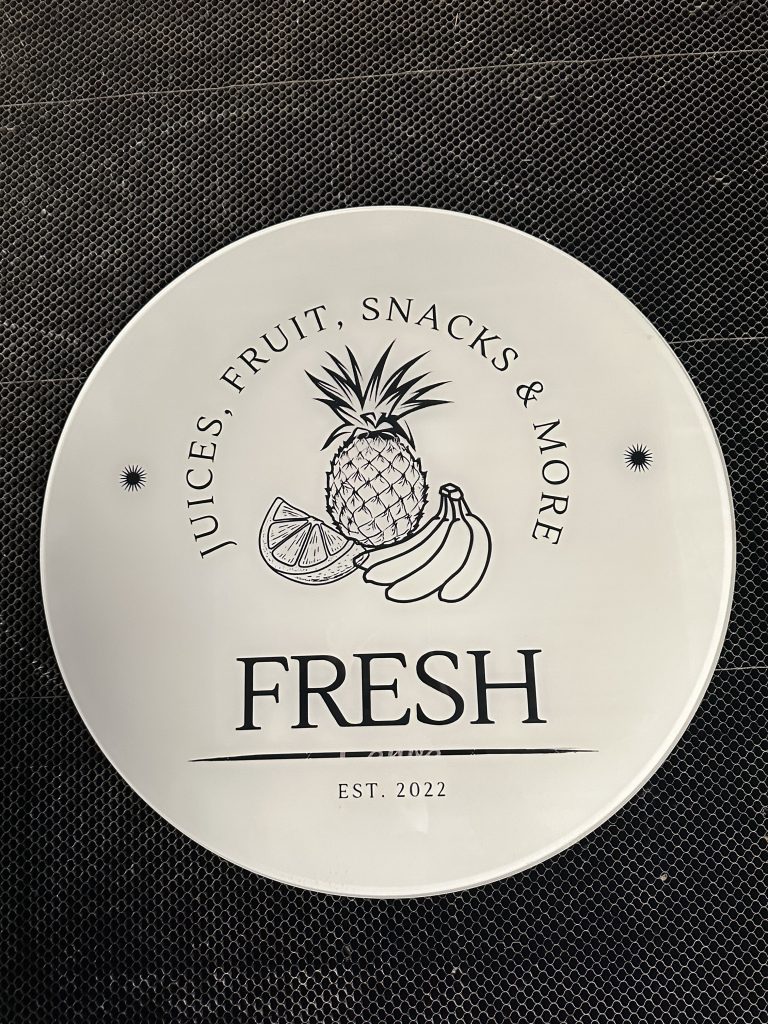 Engraved white acrylic juice bar sign