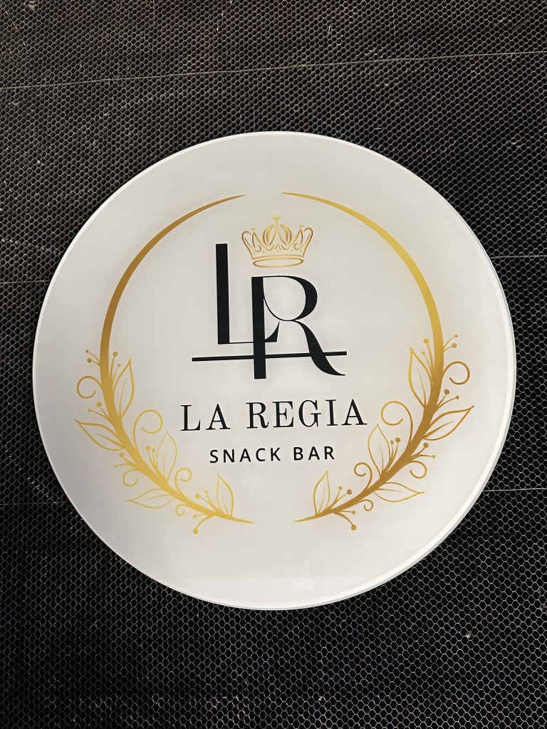 Custom acrylic logo sign for La Regia Snack Bar