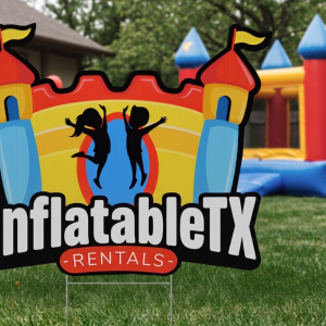 custom printed corrugated sign with contour-cut bounce house logo staked in a backyard lawn