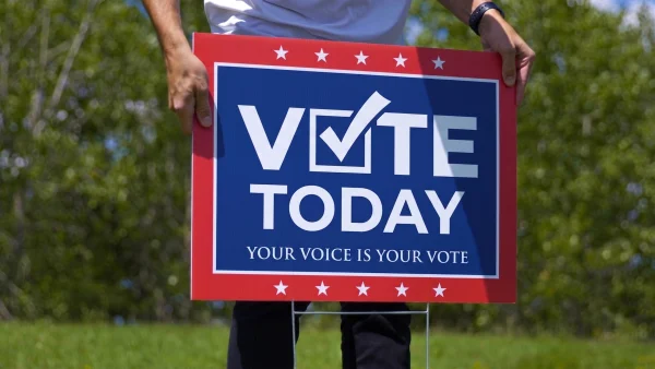 custom printed corrugated sign - Vote Today political yard sign held outdoors
