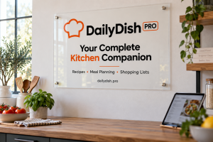 Clear acrylic DailyDish Pro sign with an orange chef-hat logo and black text mounted with metal standoffs.